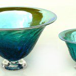 Two bowls are shown side by side, one of which is blue.