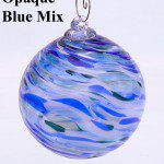 A blue glass ornament with the words " opaque blue mix ".
