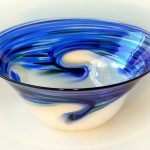 A bowl with blue and white swirls on it